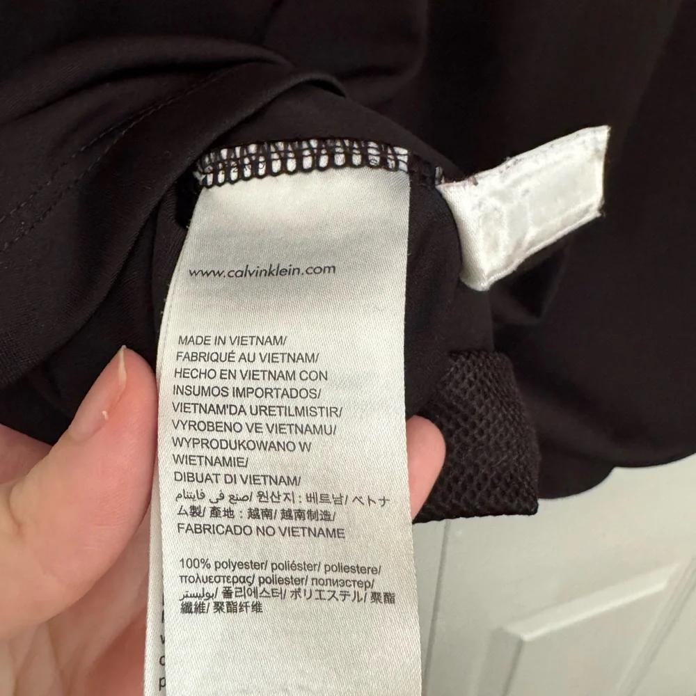 Calvin Klein Men's Polo Shirt in Black with Red Accents - Picture 6 of 6